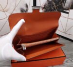 hm clutch constance 20.5 orange calfskin silver hardware