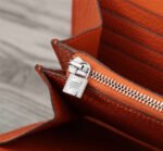 hm clutch constance 20.5 orange calfskin silver hardware