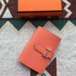 bearn compact wallet 12 in pumpkin orange epsom leather