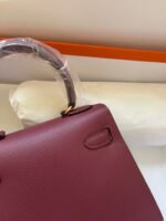 kelly mini 20 bag in garnet red calfskin with gold hardware