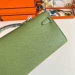 kelly cut 31 in apple green calfskin with gold hardware