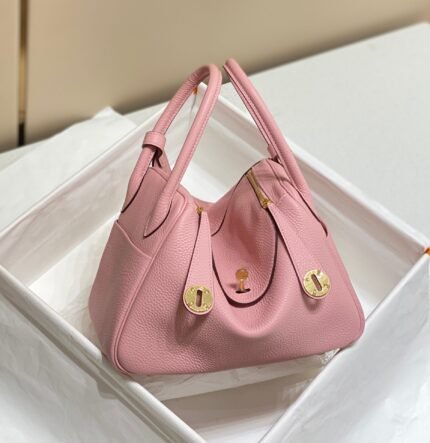 hm lindy 26 bag in baby pink togo leather gold hardware