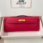 kelly cut 31 in cherry red calfskin with gold hardware