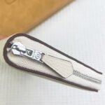 hm silk'in holed classic wallet 20 white grained calfskin