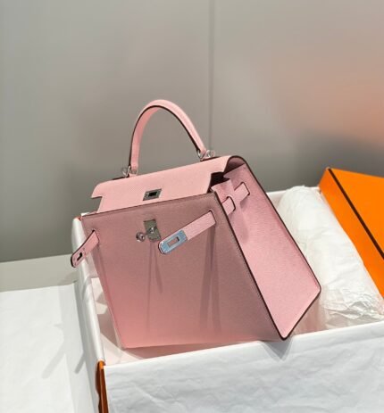 kelly 25cm in rose sakura swift calfskin silver hardware