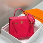kelly 25cm in rose tyrien swift calfskin gold hardware