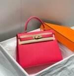 kelly 28cm in rose tyrien swift calfskin gold hardware