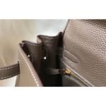 herm kelly 25cm retourne bag in taupe clemence leather