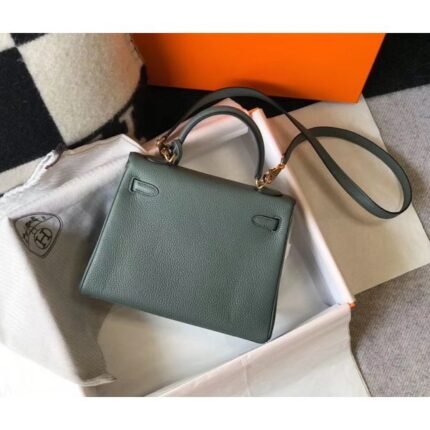 herm kelly 25cm retourne bag in vert amande clemence leather