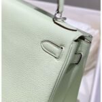 herm kelly 25cm retourne bag in vert fizz clemence leather