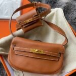 Herm??s Kelly Moove Handmade Bag in Gold Swift Calfskin