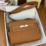 HERM Kelly Messenger Bag in Gold Clemence Leather