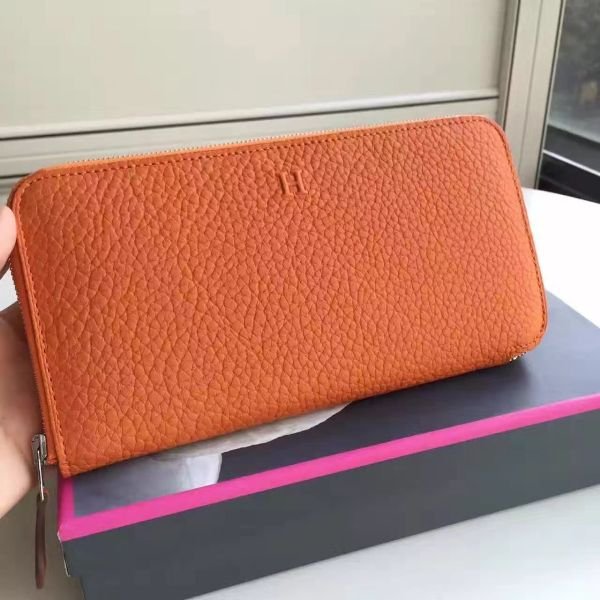 hwaclor_95bc465b-00fd-4b5d-b01f-db9f2ce1ac6f.jpg HERM Orange Clemence Azap Zipped Wallet - 图片 1