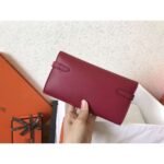 herm kelly classic long wallet in ruby epsom leather