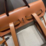 herbag a dos zip retourne backpack 29 in off white canvas and brown calfskin