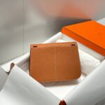 halzan 25 handle bag in dull orange grained calfskin