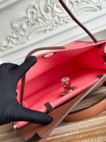 zip cabine 31 bag in punch pink canvas and bronze brown calfskin