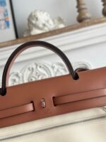 zip cabine 31 bag in white cream canvas and bronze brown calfskin