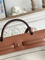 zip cabine 31 bag in pale gray canvas and bronze brown calfskin