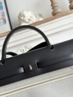 zip cabine 31 bag in pale gray canvas and black calfskin