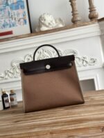 zip cabine 31 bag in chocolate brown canvas and black calfskin