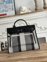 zip cabine 31 bag in black mix white canvas and calfskin