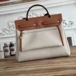 herbag zip 31 laquered bag in off white mix yellow h plume canvas