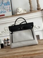 herbag zip 31 laquered bag in off white mix black h plume canvas
