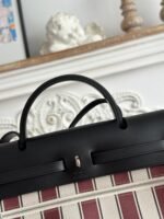 herbag zip 31 laquered bag in brown mix yellow h plume canvas