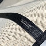 garden party 36 in beige orange and brown toile h canvas black calfskin horse totem print