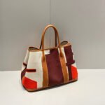 garden party 36 in multicolor toile h canvas gold calfskin abstract geometric blocks print