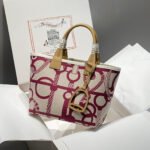 steeple 28 bag in off white mix persian plum red canvas and brown swift leather