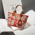 steeple 28 bag in off white mix light red canvas and brown swift leather
