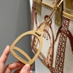 steeple 28 bag in off white mix brown canvas and calfskin