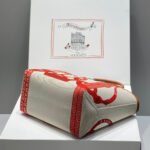 steeple 28 bag in off white mix red canvas and brown calfskin