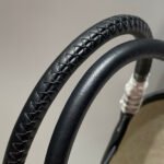 steeple 28 bag in off white h canvas and black swift calfskin