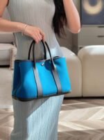 garden party 30cm in blue toilets cotton canvas and black calfskin