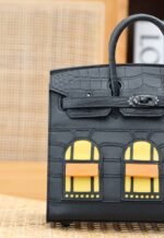 birkin faubourg touch 20 in black calfskin with silver hardware