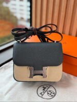 Hermes Handcrafted by masters Mini constance CK3T Carbon grey goatskin with silver buckle and K engraving