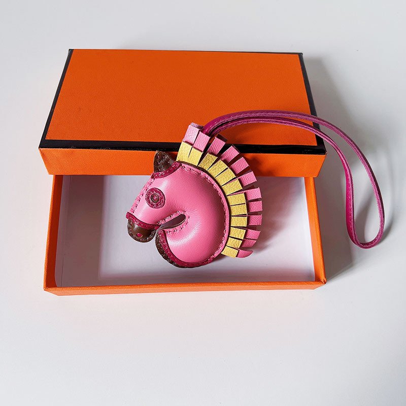 AFFA088A-CF3C-A2EF-B789-54D3FFBD89E6.jpg Handsewn unicorn pendant - Image 1