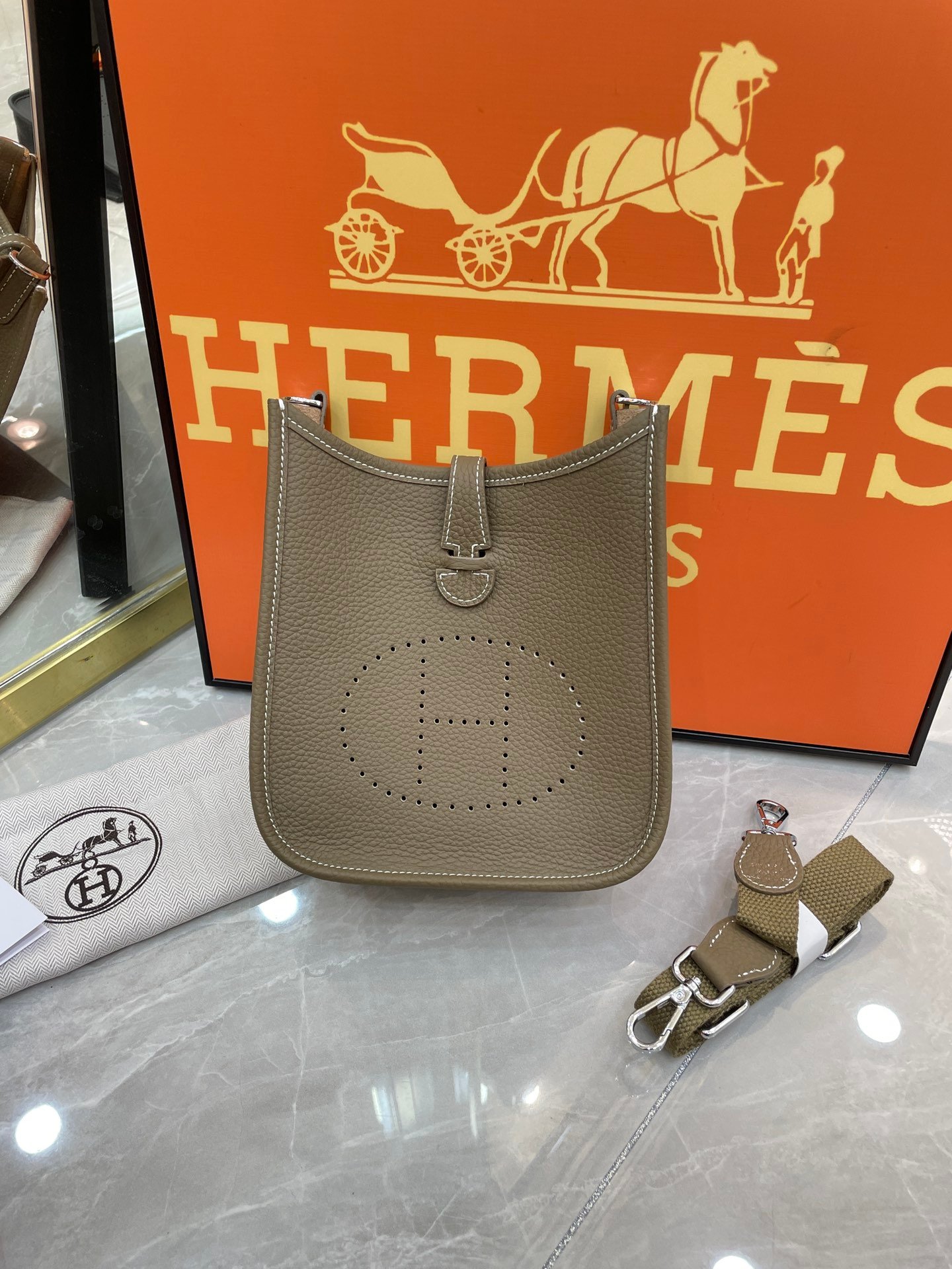 FC3A1AA8-C326-548F-4B95-F1840C03A606.jpg Hermes Evelyn 16-19 - Image 1
