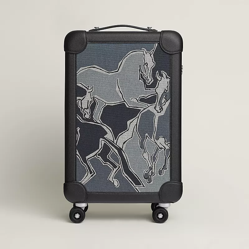 edf8e74426f69af695792677dd345779.webp R.M.S cabin suitcase - Image 1